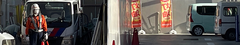 西成区のガソリンスタンドでの交通誘導警備の写真